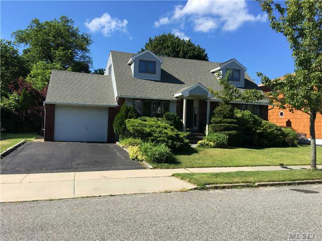 Make This Home Your Own! Expanded Cape..Cac, Hardwood Flrs, Expanded Dormer On 2nd Fl, Eik With Slidng Doors To Back Yard, Gas Cooking, Gas Dryer, 150 Amp, Close To Transportation/Shopping