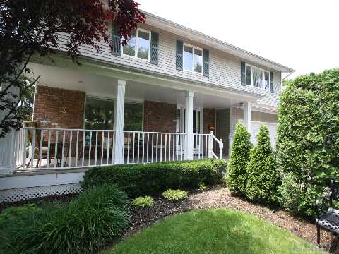 Rare Find! Expanded Double Door Colonial With Enchanting Front Porch On Shy One Quarter Private Acre. Huge Rms. Throughout. Walls Of Glass. New Fin. Basement/Playroom. 2 Room Master Suite W/Lg. Bath. So Much More! This One Must Be Seen! Please Check Out Virtual Tour!!