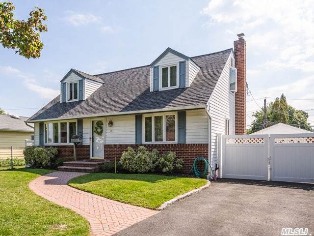 Well Kept Sunny Lg 3/4 Br (Previously 4Br) Fully Rear Dormered Ex-Cape,  Open Floor Plan,  All Lg Rms,  Full Bsmnt,  Andersen Windows,  Hw Flrs,  Carpet (Upstairs),  Hi-Hats Thru Out,  Crown Molding,  Well Mclain Boiler,  Bock Hot Water Heater,  Paver Patio,  Waste Pipe Installed For Upstairs Possible 2nd Bath,  Gas Cooking,  Fence In Private Backyard,  Close To All,  True Taxes $8, 193.47