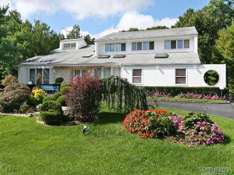 Rare Opportunity To Own One Of The Largest Well Maintained Homes In The Knolls. Grand 2 Story Entry Foyer, Italian Marble Throughout 1st Floor Updated Appliances, Extended Kitchen With Granite Countertops.Addtional Guest Suite That Can Be Converted Back To 2 Car Garage, Olympic Size In Ground Heated Pool. Professional Landscaping, Circular Driveway. Syosset Schools. 