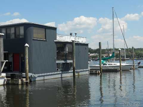 Enjoy Year Round Living Aboard This Magnificent Trilevel Housebarge,An Entertainers Delight W/2-3 Brs,17X19 Ft Lr/Dr W/Woodburning Stove,Cac,Heat,25X15 Roof Top Deck W/Mag Waterviews.