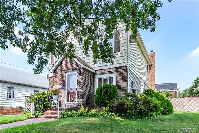 Spacious Colonial Set On Corner Lot 62' By 100' . Offering Gracious Family Room With Fireplace, Large Eat In Kitchen Appointed With Wood Cabinetry, Granite Counter, And Breakfast Area. The 2nd Floor Boasts Four Bedrooms And Full Sunlit Bath.