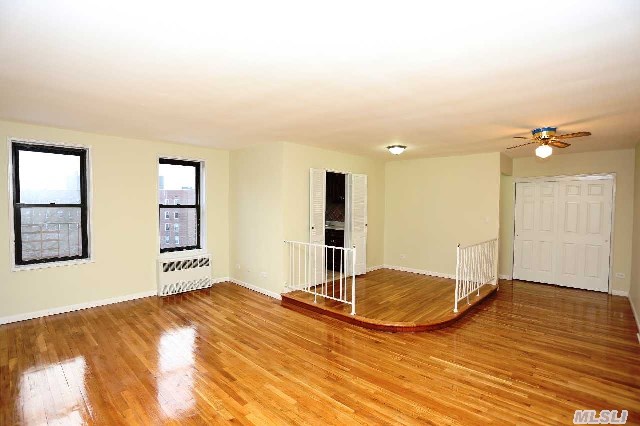 Upgraded 1 Bedrm W/Hardwood Floors,  Updated Kitchen & Bath,  W/Raised Dining Area. Doorman Building W/Laundry Facilities. Approx 5 Blocks To E & F Train @ Queens Blvd. & Van Wyck Expy.,  Few Blocks To Grand Central Pkwy. & Van Wyck Expy.,  Union Tpke. Forest Park In Close Proximity.