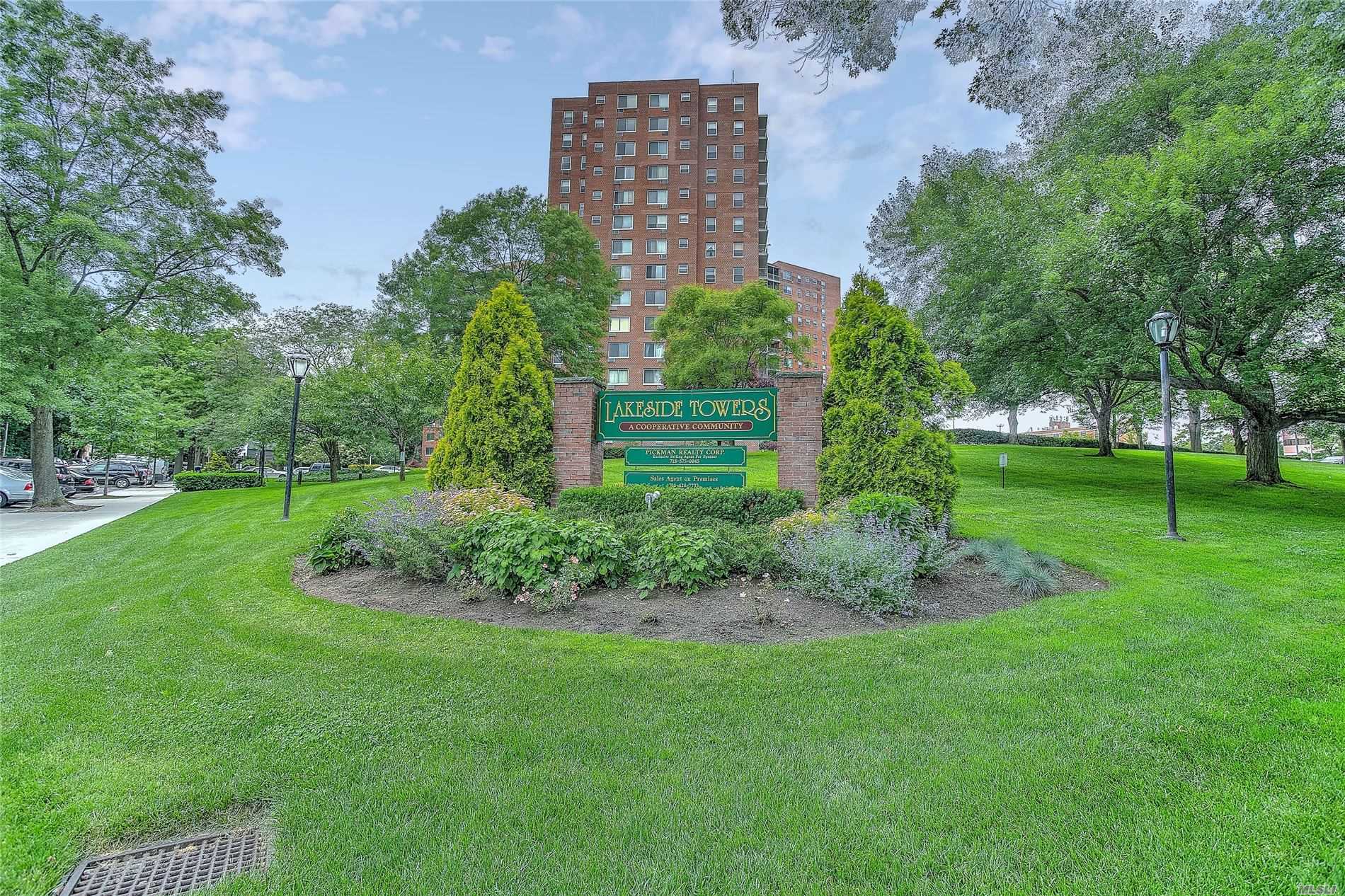 Live the Good Life-21 hour doorman, on site gym/summer pool and parking make this renovated 1 bedroom a must see! Super low maintenance includes all utilities. Enjoy your large terrace on the 15th floor which affords panoramic views. Walk and enjoy the serenity and beauty of Oakland Lake. E-Z access to major highways and minutes to the LIRR. A must see!