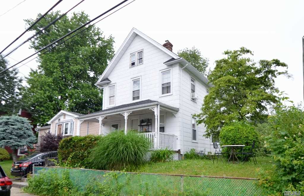 Needs TLC! As Is!! Front Porch, Lr, Fdr, Eik w/Mud Rm to Yard, Full Bath. 2nd Floor: 3 Bdrms, Full Bath. Attic For Storage. Full Unfinished Basement. Includes Extra 50x109 Non buildable Lot