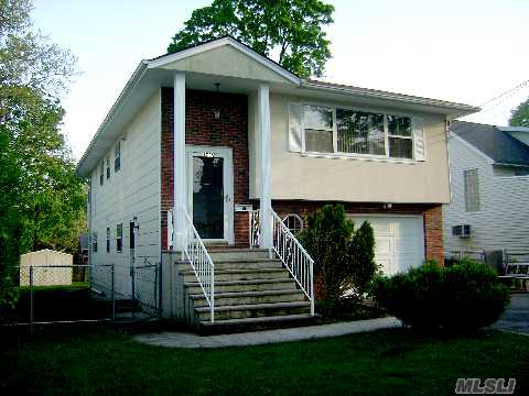 Spacious And Sunny 5 Bedroom 2.5 Baths Brick Hi Ranch In Herricks Schools! New Gourmet Kitchen, Potential For Mother-Daughter. Beautiful Tree Lined Street.