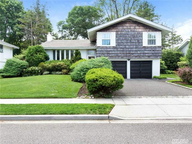 Amazing Classic Hollywood Split W/Natural Wood Cedar Shakes. Extra Insulation. New Roof. Cac. 200Amp. Igs.  Beautiful Hardwood Floors.  Updated Baths. Pella Windows. Cozy Den W/Wood Beam Ceiling. 3 Bdrm Plus 4th W/Custom Cabinetry. Retro Eik W/ New High End Double Oven & D.W. Private Backyd & Deck- Perfect For Entertaining. A Well Maintained Home!!! 2 Gar.