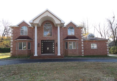 New Construction.  Roslyn Country Club.  East Williston School District #2.  Beautiful Half Acre, 5200 Square Feet.  Huge Two-Story Entry Hall With Hardwood Floors.  State-Of-The-Art Eat-In-Kitchen With Top-Of-The-Line Appliances.  This Smart House Boasts Two Master Bedroom Suites.  Radiant Heat  Too Many Extras To List.