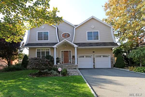 Diamond Young Open Concept Colonial With 10&rsquo; Ceilings! Expresso Wood Floors Throughout, Huge Scandinavian Kitchen With 10&rsquo; Island, Stainless Steel Appliances, Crown Moldings Throughout, Coiffered Ceilings, Cav, Cac, Green Features Throughout With Geo Thermal Heating, Surround Sound, 2 Car Garage, Fenced Yard, Solar Home! A True Stunner!