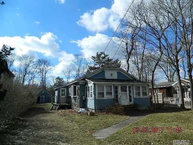 Cozy 2 Bedroom Bungalow On Large Lot. Close To All Center Moriches Amenities. A Litlle Tlc Would Restore This Cottage To It&rsquo;s Former Glory!