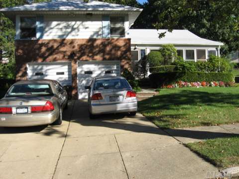 Four Level Split W/ 3 Br, 2 Bth, Lr, Dr ,Eik, Fm/Rm W/Fpl 2 Car Garage On A Very Desirable Cul De Sac In Bayside. Convinent To Transportation, Queensborough College, Cardozo, And Oakland Garden Lake 