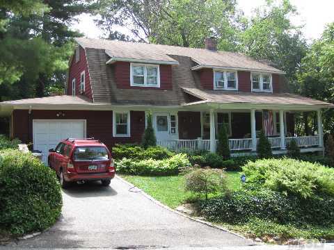 Charming 1918 Dutch Colonial Nestled On A Private Section Of Roslyn Village. 5Br, 3.5 Baths In Immaculate Condition, Kept With The Character Of The Home. Lr/Fpl And Custom Built In Details, Fdr, And Large Country Kit. Separate Wing On 1st With Lr, Br, Bath. Roslyn S.D. 