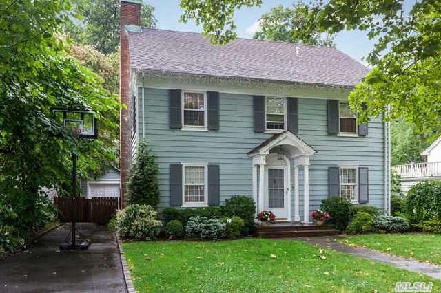 Classic Center Hall Colonial,  Rich With Charm And Architectural Details,  Expanded And Renovated To Perfection On A Quiet Street In The Heart Of Port Washington Estates.