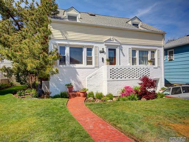 Location Says It All For This 3 Bedroom 2.5 Bath Cape That Features Spacious Rooms And Lay-Out, With Southern Exposure For Lots Of Light! High-Efficiency Natural Gas Boiler & Integrated Instant-Hot Water Heater. Central A/C With A Top Of The Line Dual Phase System, New Wood Floors, Upstairs New Ceiling Fans Gas Fireplace, Wonderful Front And Back Porch, Huge Back Yard.