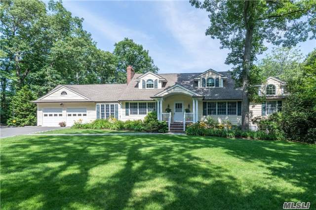 Charming Nantucket Style Home W/Immense Curb Appeal & Stylish Decor. 4/5 Bedrooms, Updated Baths, Hardwood Floors, Extensive Moldings, 15&rsquo; X 20&rsquo; Lr W/Fpl & Light Filled Dr, 12&rsquo;5 X 21&rsquo;4 Family Rm W/ Wood Details, Chic 1st Floor Master Suite. Finished Lower Level W/Rec Space & Ose. 2.2 Acres W/Entertaining On Deck & Patio. Laurel Hollow Beach/Mooring Rts.