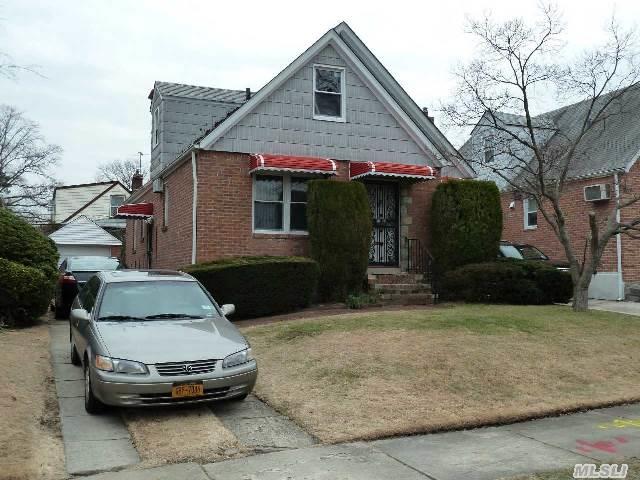 Beautiful Cape Home Situated In A Desirable Residential Area.  It Features 4 Bedrooms,  2 Bathrooms,  Hardwood Floors Throughout And Finished Basement. Spacious Back Yard With 1 Car Garage And Private Driveway And Near Mass Transit,  Major Highways And All. Excellent Condition. A Must See.