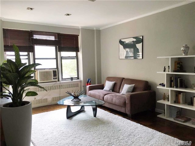 Beautifully Renovated 2-Bed Jr4 Coop. Recessed Lighting In The Living Room And Crown Molding Throughout The Apartment Plus Much More Upgrades. Very Low Maintenance. Part-Time Doorman. Pets Friendly Building (Dogs Up To 40 Lbs). Only 5 Min Walk To Local M/R And 10 Min Walk To Express & Local E/F/M/R & Lirr.