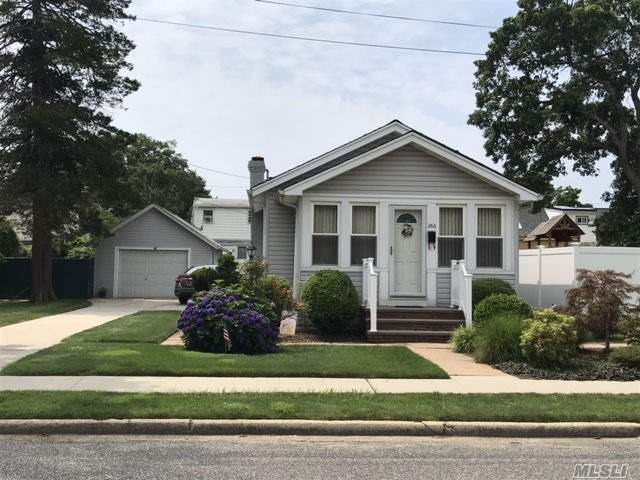 Charming Bungalow/Cottage Style Home Features: New Siding, Updated Windows, Updated Cac, Updated Bath. Updated Heat And Hw System. Part Finished Basement. Beautifully Landscaped. Low Taxes, Plainedge Schools. Please Note Bathroom Is In Basement.