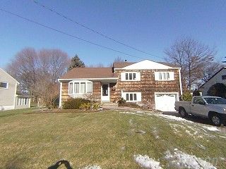 Perfect Tree Lined Street. Mid Block Location. Oversized Country Club Yard. Jericho Schools. Jackson Elementary.  In Ground Sprinklers. 