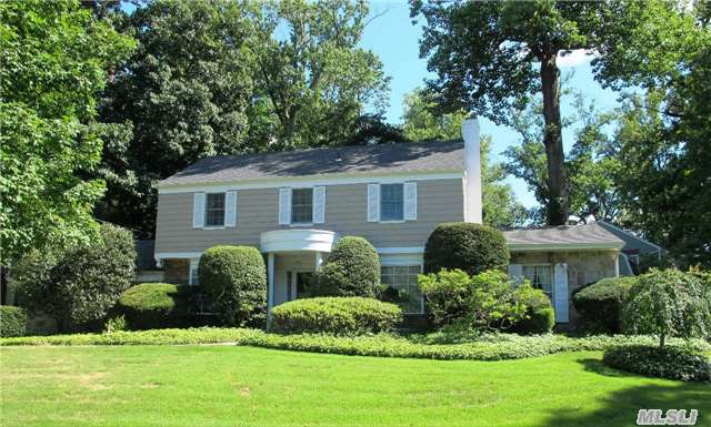 Lake Success Meadow Woods Mint C/H Colonial On Wonderful Block. Sunny Interiors With Custom Moldings & Random Width Pegged Hardwood Floors. Vaulted