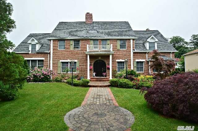 Magnificent All Brick Center Hall Colonial Totally Renovated In Desirable Village Of Kensington. 6 Bedrooms,  5 Full Baths,  2 Half Baths. This Traditional And Elegant Home Also Features A Wood Paneled Library And An Oversized Beautiful All Granite And Wood Kitchen With Separate  Dining Area. Elegant Interior D?cor Includes Columns,  Moldings And Floors. Special Private Balco