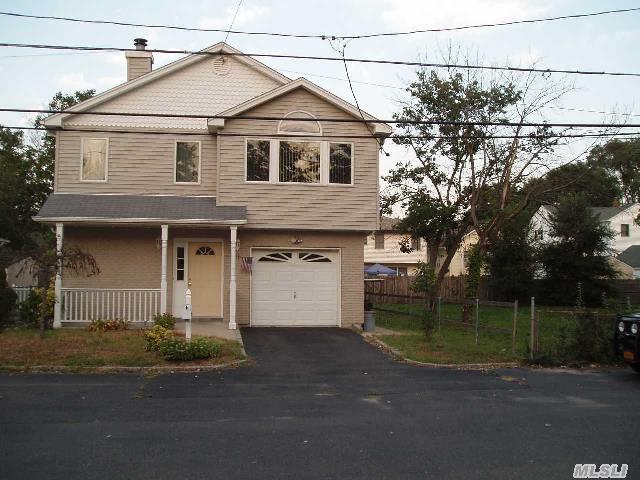 Great Two Story Home Needs To Be Raised Up. 3 Or 4 Bedrooms With Den,  Office/Bedroom On First Floor. On Second Floor Is An Eat In Kitchen,  Living Room With Fireplace,  L Shaped Dining Room,  3 Bedrooms,  Full Bath,  Attic For Storage.