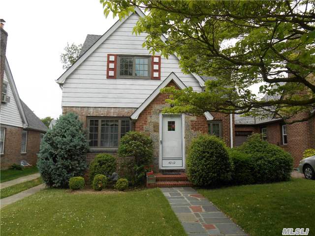 Simply Charming And Lovingly Maintained Colonial On A Tree Lined Dead End Street. Living Room With Wood Burning Fieldstone Fireplace, Formal Dining Room, Hardwood Floors, Eat-In- Kitchen, Cac. Bright And Sunny Family Room Overlooking Yard With Mature Plantings. 3 Bedrooms, 1.5 Bath. Walk To Lirr And Restaurants And Shopping.