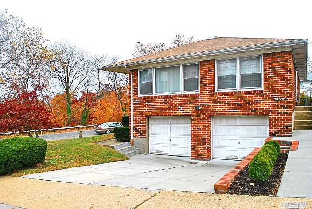 Detached Brick Hi-Ranch On Oversized 5, 500 Sq Ft Lot. Features Lr,  Dr,  Eik,  3 Br's And 2 Full Baths,  Plus A Walk-In Basement With 2 Car Garage,  Huge Den,  Office,  1/2 Bath,  2 Zone Gas Heat,  Closets Galore And A Huge Yard. Dw As-Is. P.S 159 & I.S. 025