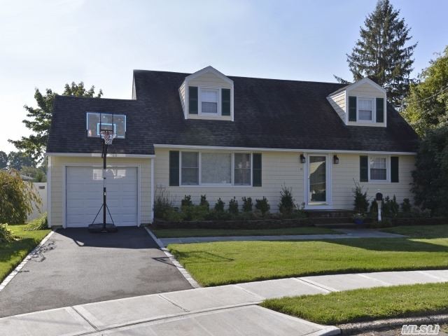 Newly Updated Cape Located On Cul-De-Sac In North Syosset. 4 Bedrooms,  2 Full Baths,  Hardwood Floors,  Architectural Moldings,  Large Open Kitchen W/Sliders To Huge Deck. Updated Roof,  Burner,  Windows,  Driveway. Beautiful Backyard And Landscaping. Award Winning Syosset Schools. Close To Town And Train. A Must See!!!!