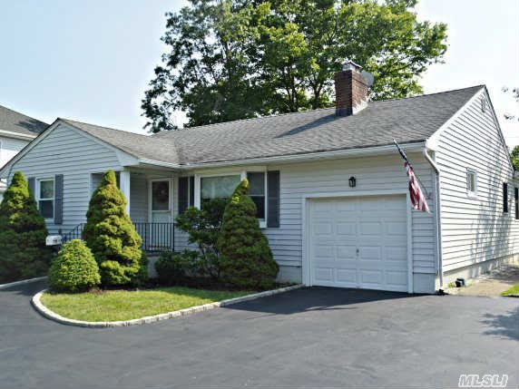 Beautifully Expanded Ranch  With Vinyl Siding,  Full Finished Basement And Den Overlooking Picturesque  Backyard. Living Room With Fireplace,  Dining Room And Spacious Updated Eat In Kitchen. Over Sized Master Bedroom And Updated Bathroom. Hardwood Flooring Through Out And All Window Treatments Included. Igs,  Cac,  1 Car Garage And Deck.