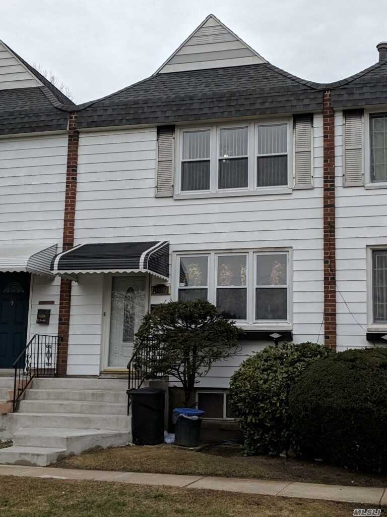 Gorgeous in mint condition 3 levels townhouse condo with 1 assign parking space. Home featured 1/FL .. sunken living room leading out to backyard with over 10&rsquo; ft ceiling, dining room, separate kitchen area and 1/2bath.  2/FL... 3 spacious bedrooms and full bath. Basement finished with family and utility room, CAC, plenty of windows bright and sunny. 2 blocks to Manhattan Express Bus and local buses, 5 minutes drive to LIRR, close to shopping and all.