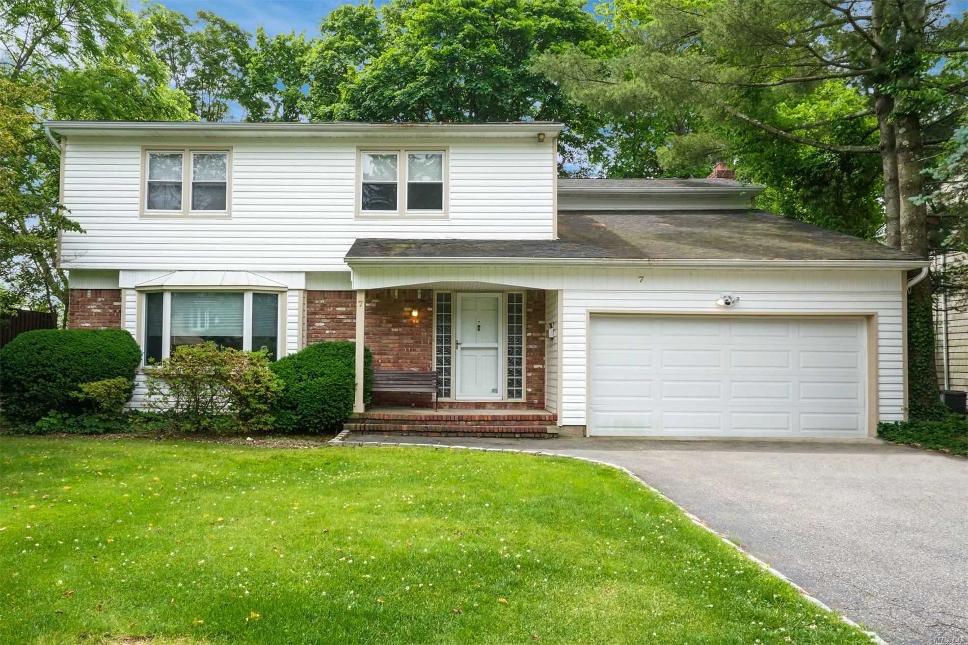 North Syosset young 2380 sq ft home located in a cul-de-sac with an easy distance to train & town. Large entertaining rooms, slider from kitchen leads to large private deck! Cozy Den with fireplace, master suite, 6 year young roof, generator, CAC, IGS Gas heat & cooking!! Truly a gem!!