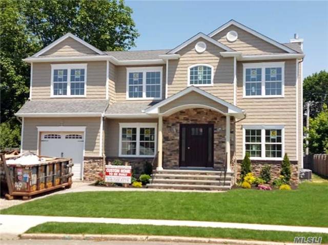 Brand New Flawless Syosset Grove Center-Hall Colonial On Deep 65&rsquo;X121&rsquo; Property. Home Is 99% Complete-- Can Close W/ C Of O By Mid August! Interior Pics Are Of Same Model Home Built Previously. 9&rsquo; 1st Flr Ceiling, 1st Flr Bdrm/Office & Fbath, Pella Wdws, Alarm, Surrnd Snd, Loaded W/ Intricate Trimwork, Custom Wood Cabs & Vanities W/Granite Ctr-Tops, Ss Prof Appliances, +++!