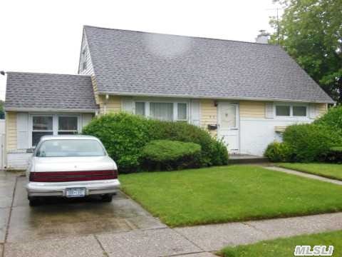 This Home Sits On A Quite Dead End Block.  Has Potential Needs Updating And Could Be A 4 Bdrm Home. Near Schools #6 And #4