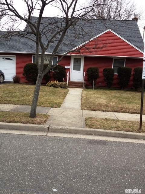 Location!!Location!!Great Opportunity,  Walk To Train Station And Stores. House Needs Work.