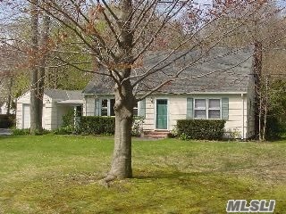 Four Bedroom Cape W/Full Basement, Hardwood Floors, Fireplace, Attached One Car Garage On Over A Half Acre, In Great Neighborhood Close To Elementary School!