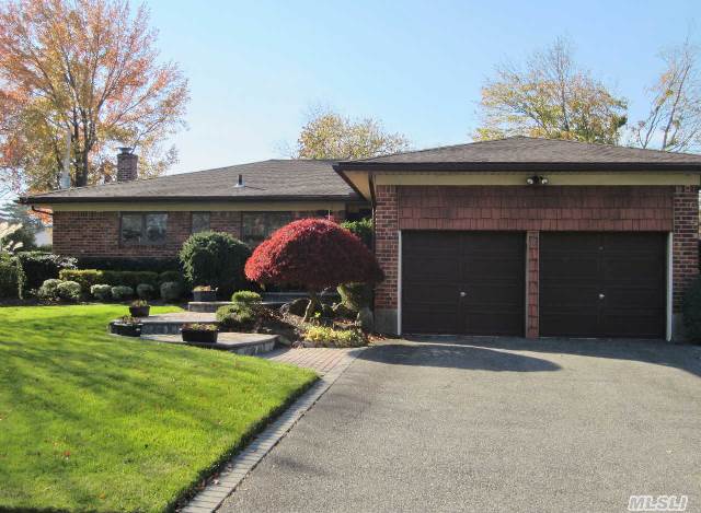 Mint Brick Ranch In Mid Block On Professionally Landscaped Grounds. Ch W Vaulted Ceilings And Skylight Leads To A Family Room,  Living Room W Brick Wall Fireplace,  Eat In Kitchen W Corian Counters And A Formal Dining Room. 3 Bedrooms And 2 Full Bath Complete The First Level. Loaded W Amenities Including New Roof,  Andersen Windows,  Cac,  Gas Heatalator,  Alarm,  Ugs,  New Hw Htr