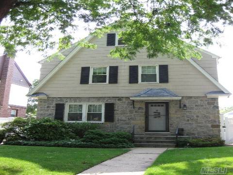 Beautiful Bayside Hills Center Hall Colonial, 3Br/2.5 Bath Walk To Lirr And Shopping. Renovated Eik, Full Finished Basement W/ Laundry And Full Bath. Walk Up Stairs To Finished Attic W/ 2 Big Rooms. All New Windows, Cac, Alarm System, Newly Refinished Hardwood Floors. Backyard Is Very Private And Fully Fenced, Professionally Landscaped W/ Sprinkler System. Sd #26 Schools.