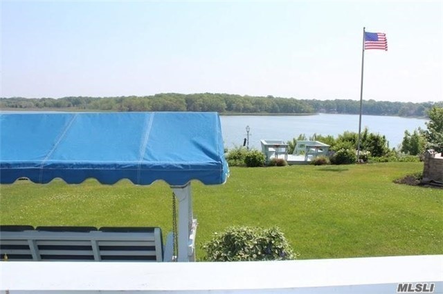 Fabulous 3 Bedroom Waterfront Home On 75 Ft. Of Arshamomaque Pond With Access To Peconic Bay, Open Floor Plan, Fireplace, Cac, Hardwood Floors, Garage And More. 2 Waterfront Decks, Panoramic Views And Sunsets That Surround You In Every Season. Private Dock. Enjoy Kayak, Canoeing, Boating, Paddleboarding Or Fishing Just Outside Your Back Door. Beautiful Deeded Sound Beach.