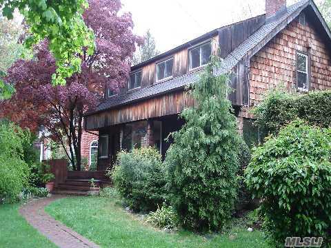 Charming Colonial In The Most Prestigious Location Of Kings Point. Large Living Room With Fireplace, Beautiful Den, Walls Of Glass, Eat In Kitchen, Large Deck, Private Setting. Needs Some Tlc But Well Worth It. 