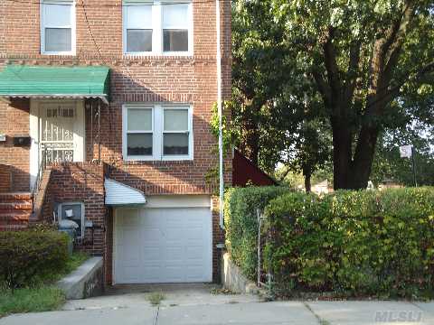 Semi Detached Brick Colonial   Lg Lr, Formal Dr,Eat In Kitchen  3 Brs 1.5 Baths.  Blocks To  Ps 200/ Shopping & Transportation.  Taxes Should Be Verified