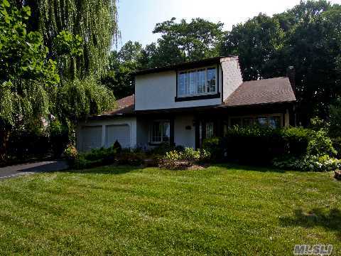 Gracious Center Hall Colonial Home On Approx. 1/2 Acre. 5 Br Split W/Sep Music Loft (Can Be 6th Br). Features A Open Living Room W/Frml Dining Area,  Eik,  Great Room,  & 3 Baths. 2 Car Garage,  Dishwasher 2 Months Young,  New Side By Side Fridge,  & Micro/Conventional Oven,  & Hardwood Floor Through Out. Residents Have Access To Golf Course,  Town Beaches,  Tennis Court & Shopping