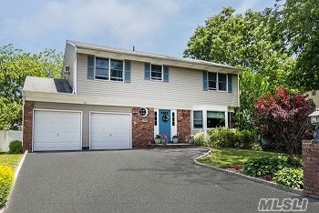 Custom Built Colonial Set On Picturesque Grounds. All Updated. Four(4) Bedrooms, Full Basement, 2 Car Garage.