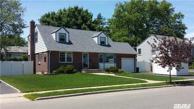 Updated Expanded Cape W/Rear Dormer Located On A Great Location, Quiet Street, New Front Door, New Hw Floors, Recently Finished Basement, Beautiful Kitchen, Granite Counter Top, Alarm, In Ground Sprinklers, Gar W/2-Car Driveway, M/Br Walk-In Closets, Shed, Appealing Landscaping, Must See, Won't Last.