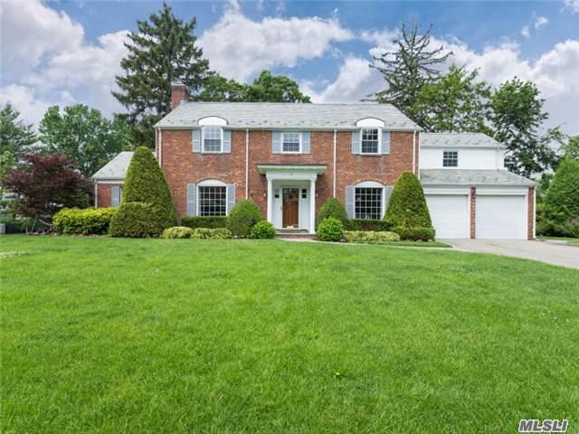 Beautifully Bright Center Hall Colonial Located In The Heart Of Munsey Park. Formal Living Room With Double Sided Fireplace A Family Room With High Ceilings, Formal Dining Room, 4 Bedrooms, Attached 2 Car Garage, Corner Property, Private Yard.