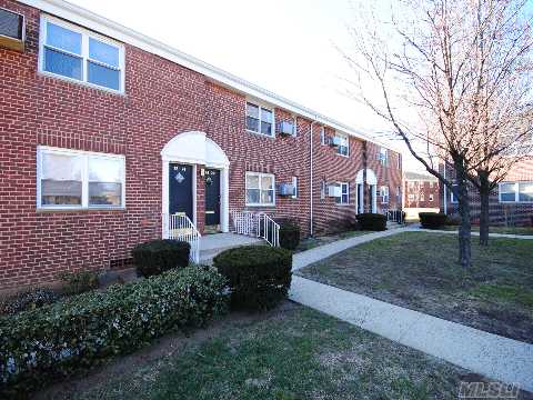 One Bedroom Upper Unit In Treelined Courtyard. Spacious, Sunny Rooms. Newly Renovated Kitchen With Maple Cabinets & Stainless Steel Appliances. Ceramic Tile Floor. Updated Bathroom. Large Lr/Dr Combo With Hardwood Floors. Attic For Storage. Two Ac's, Ceiling Fan & Plantation Blinds Included In Sale. 2 Stickers For Parking. Parking Behind Apartment. Express Bus To Manhattan