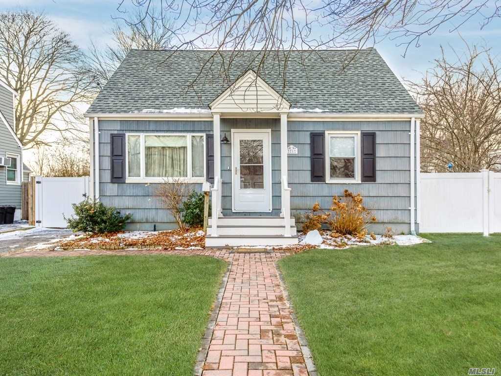 Adorable Expanded Cape On A Quiet Cul-De-Sac Featuring 4 Bedrooms, 1 Full Bath, Hardwood Floors And Large Finished Basement Den/Playroom. Fully Fenced Yard With Oversized Detached Garage. Upgrades Include 200 Amp Electric Service Roof And Gutters. Close To Train, Village & Schools.