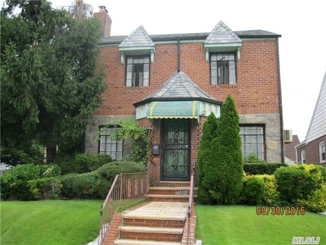 All Brick Tudor Colonial On Stunning Park Like Grounds. This 4 Bedroom Plus1.5 Bath Home Boasts Lovely Livingroom With Stone F/P Fdr Spacious Kitchen With Sep Breakfeast Nook, Three Bedrooms Plus Finished Attic, Basement Has Separate Entrance.Exterior Mint! Interior Needs Tlc