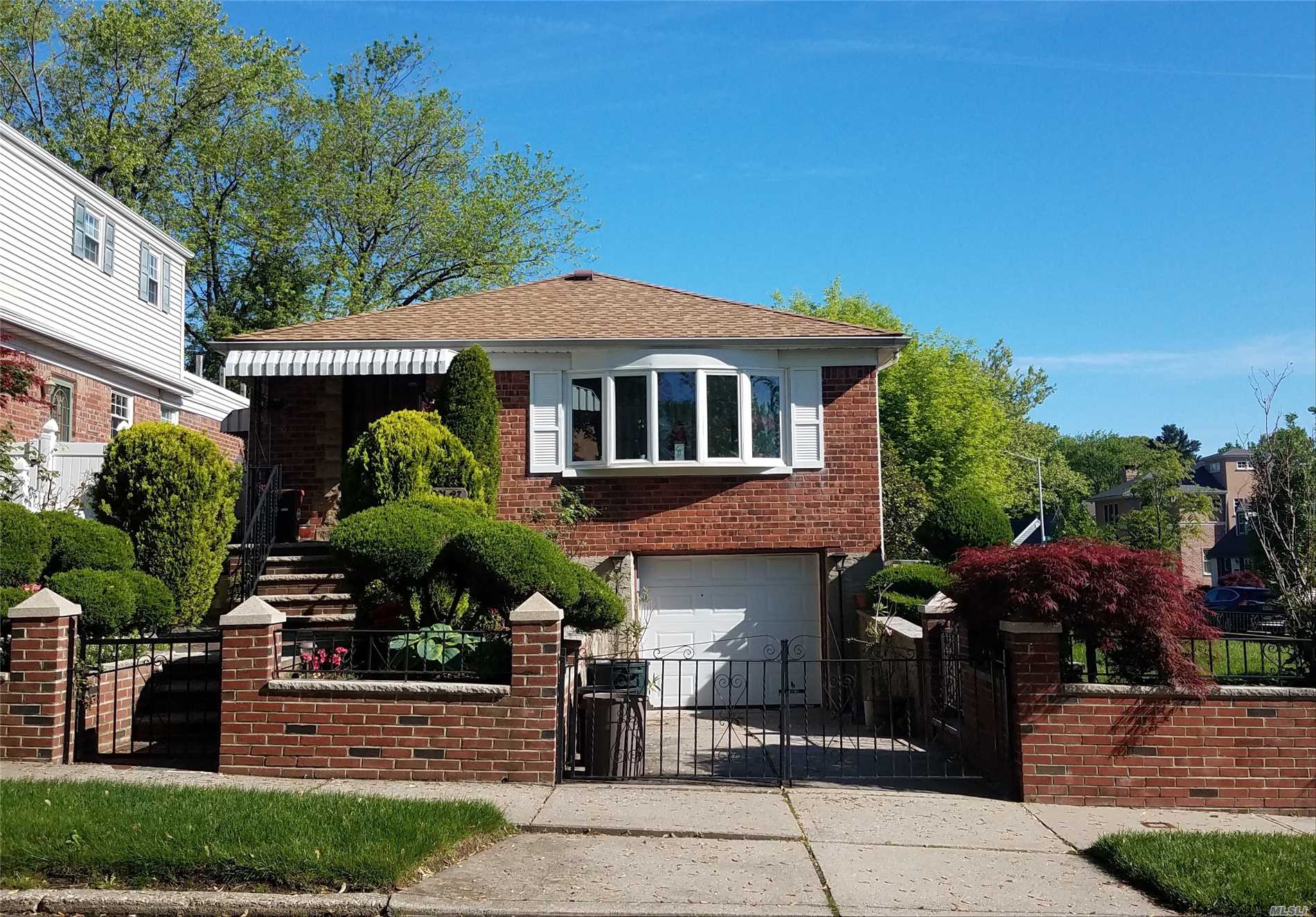 This Prominent Corner Lot Home Sits On A Quiet, Pristine Street! This Home Boasts Ample Room Sizes, Huge Finished Basement, 3 Br&rsquo;s & 1/2 Baths On The Main Floor. Lrg. Raised Ranch Features Multi-Zone Cac, Ing. Sprinklers, Se Exposure, & A Beautifully Enclosed, Professionally Landscaped Yard. This Beautifully Maintained Home Is Situated In North Bayside, Close To Great Schools, Transportation, & Shops! House & Lot Look Even Larger Than It Is! P.S. 184 & I.S. 25.