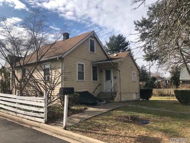 Tremendous possibilities await this cozy 1 Family ranch that is strategically placed on a park like, sunny southern exposed corner property. Basement, attic and oversized 1 car detached garage plus ample additional parking. Locust Valley schools. Close to train and town. Why pay rent when this can be yours?
